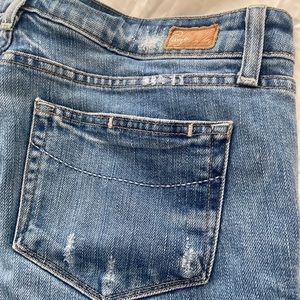 PAIGE “Skyline” distressed light wash ankle jeans